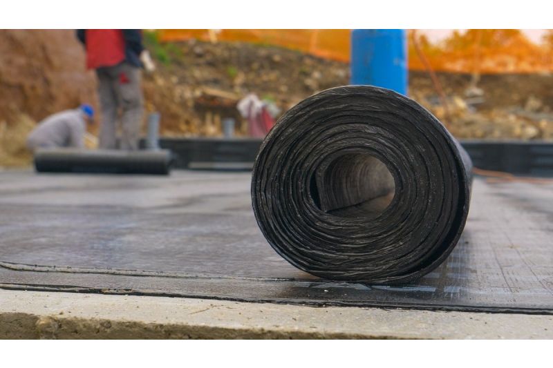 A roll of protective floor sheeting