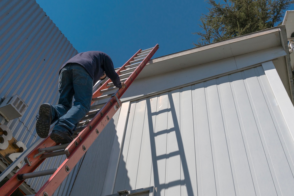 Man climbs a ladder